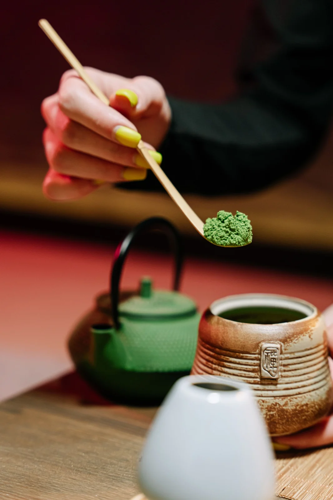 A spoonful of matcha, precise and deliberate
