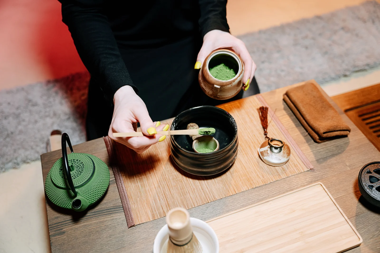 Preparing matcha tea, a quiet ritual of patience and care